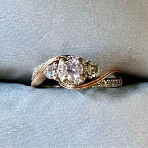 White and rose gold diamond ring. Sz. 5.5 “past present future”